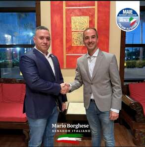 Dennis Casco with Italian Senator Mario Borghese during an institutional MAIE meeting